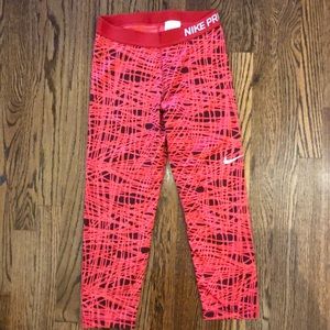 Nike Pro red and black logo crop leggings